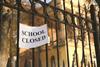 School closed sign on railings shutterstock_569263987 Africa Studio